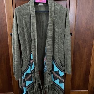 Shorter back.Fringe. Olive/black/teal/melon. Med.